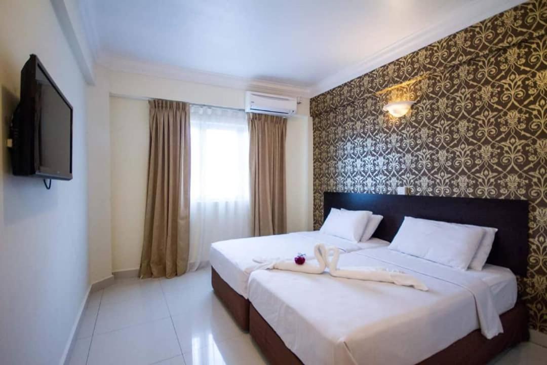 Hotel Sea Princess Телук Баханг Екстериор снимка